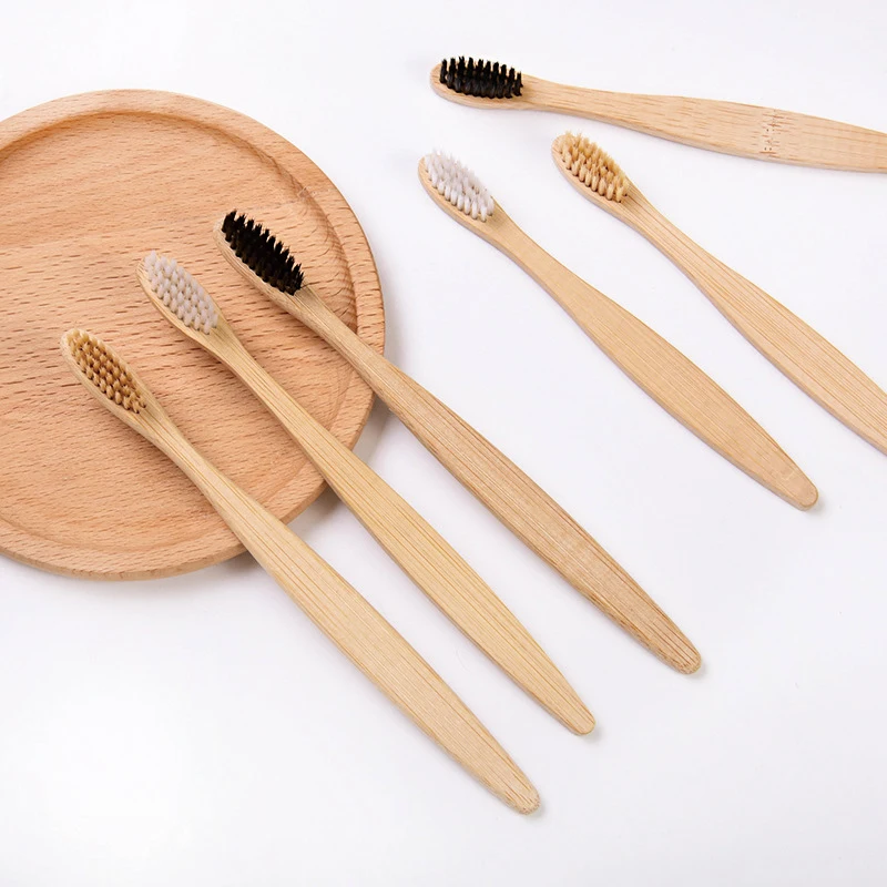 100%天然竹制牙刷，配柔软尼龙刷毛，环保一次性家用牙刷